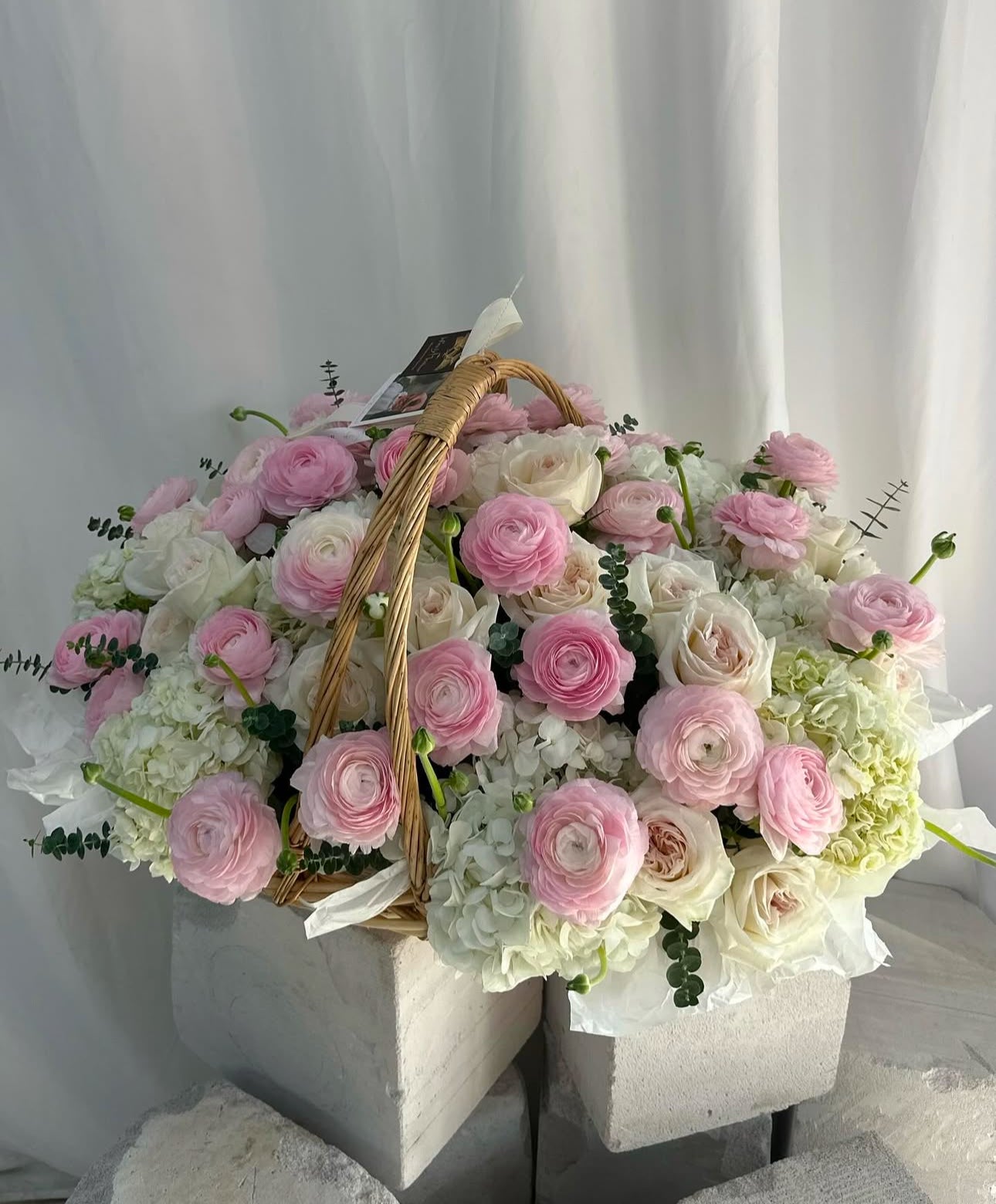 «Blossom basket» ranunculus, hydrangeas, roses