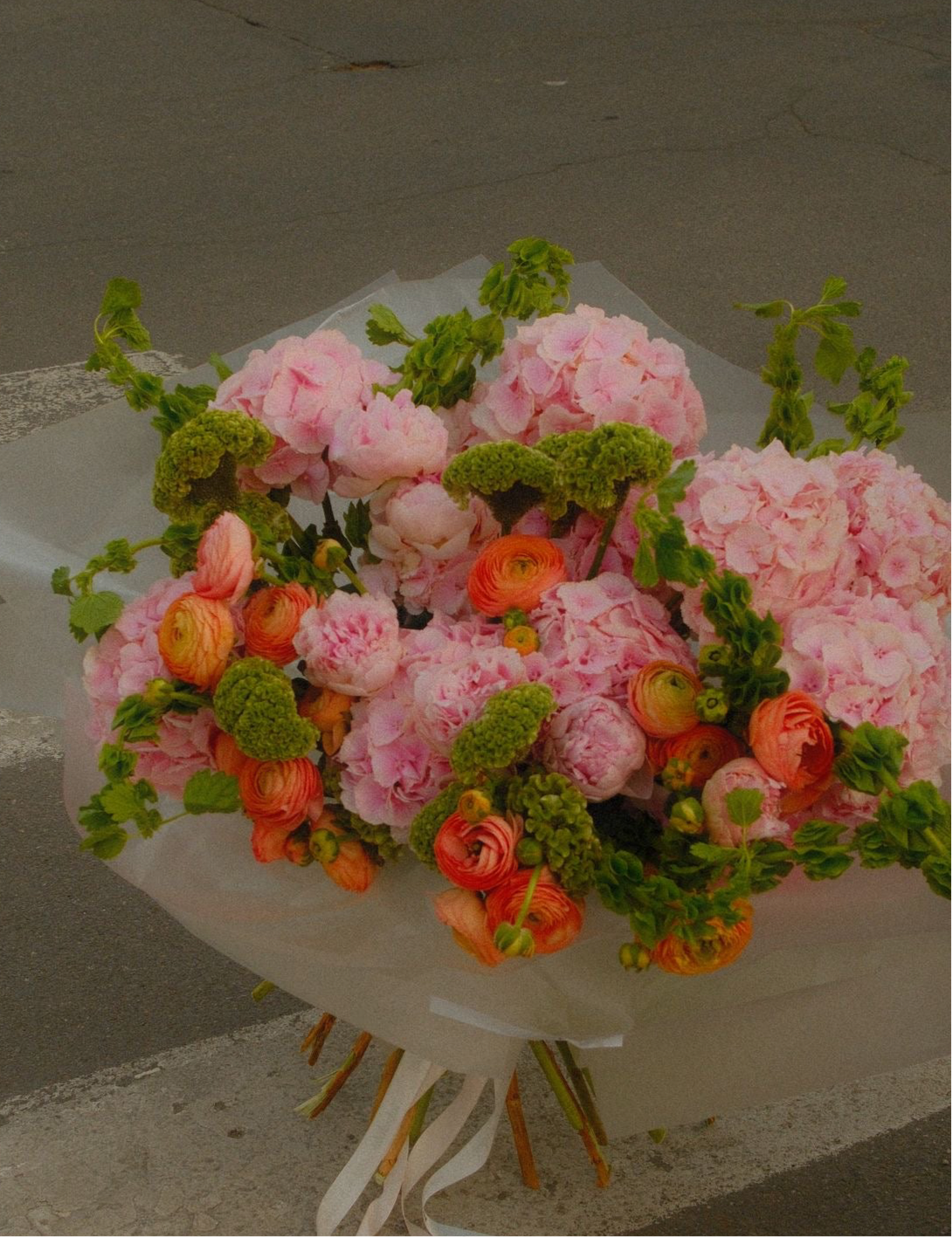 «Orange juice» hydrangeas, ranunculus, bells, carnation