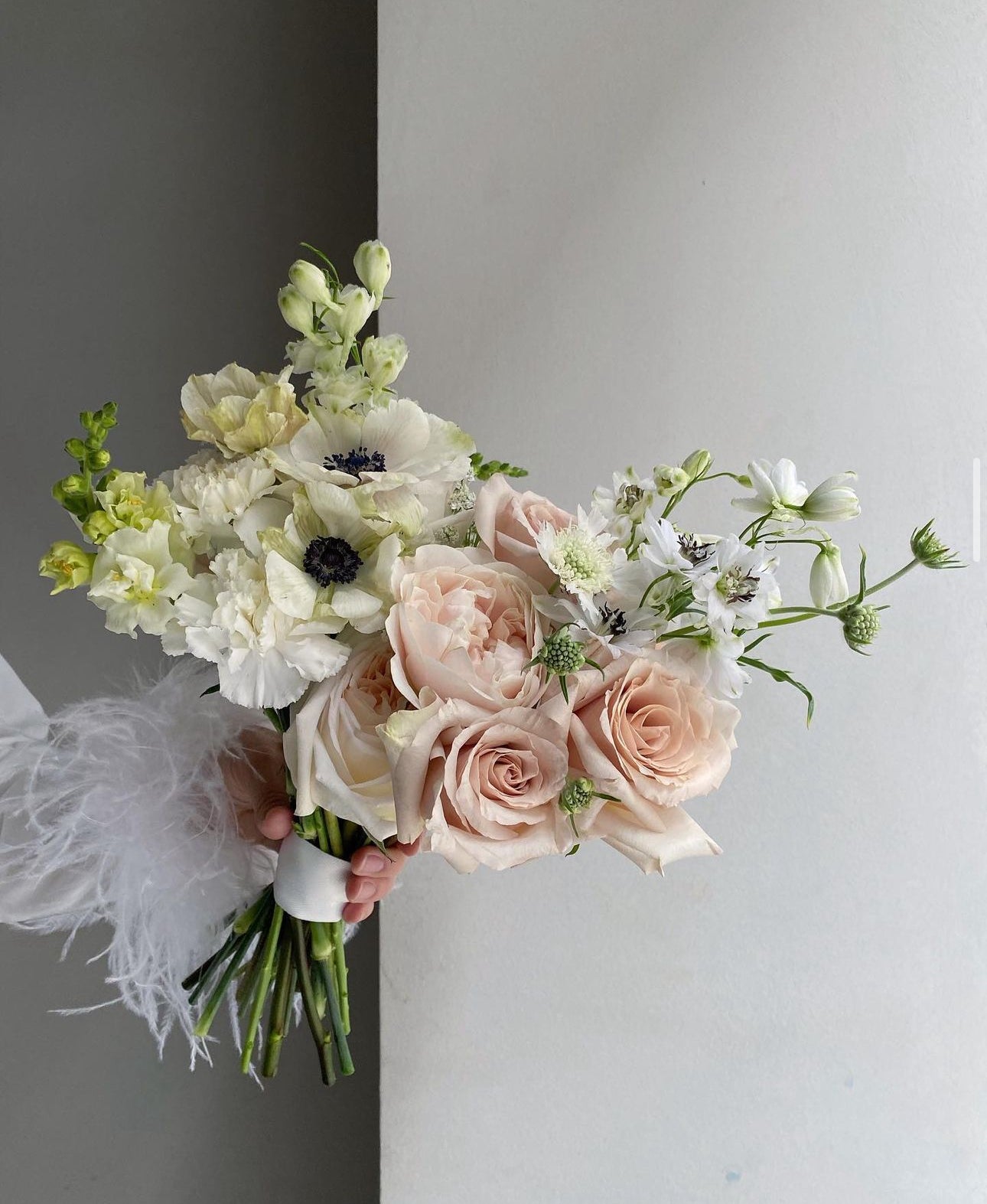 Wedding bouquet «Cozy garden» roses, anemones, delphinium, carnations