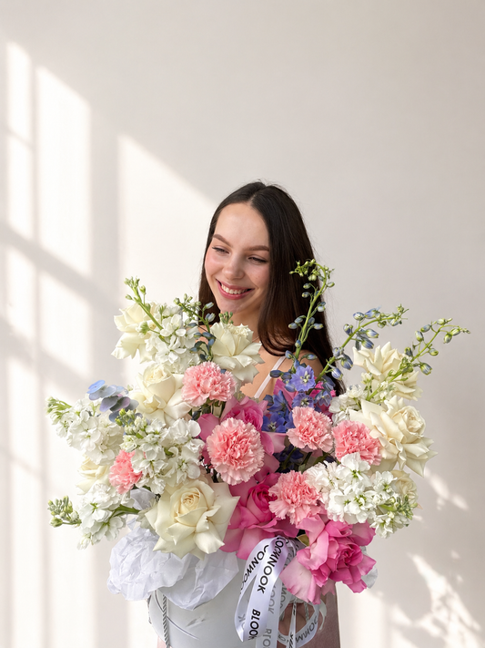 «Spring mood» box with French roses, carnation, delphinium, stock
